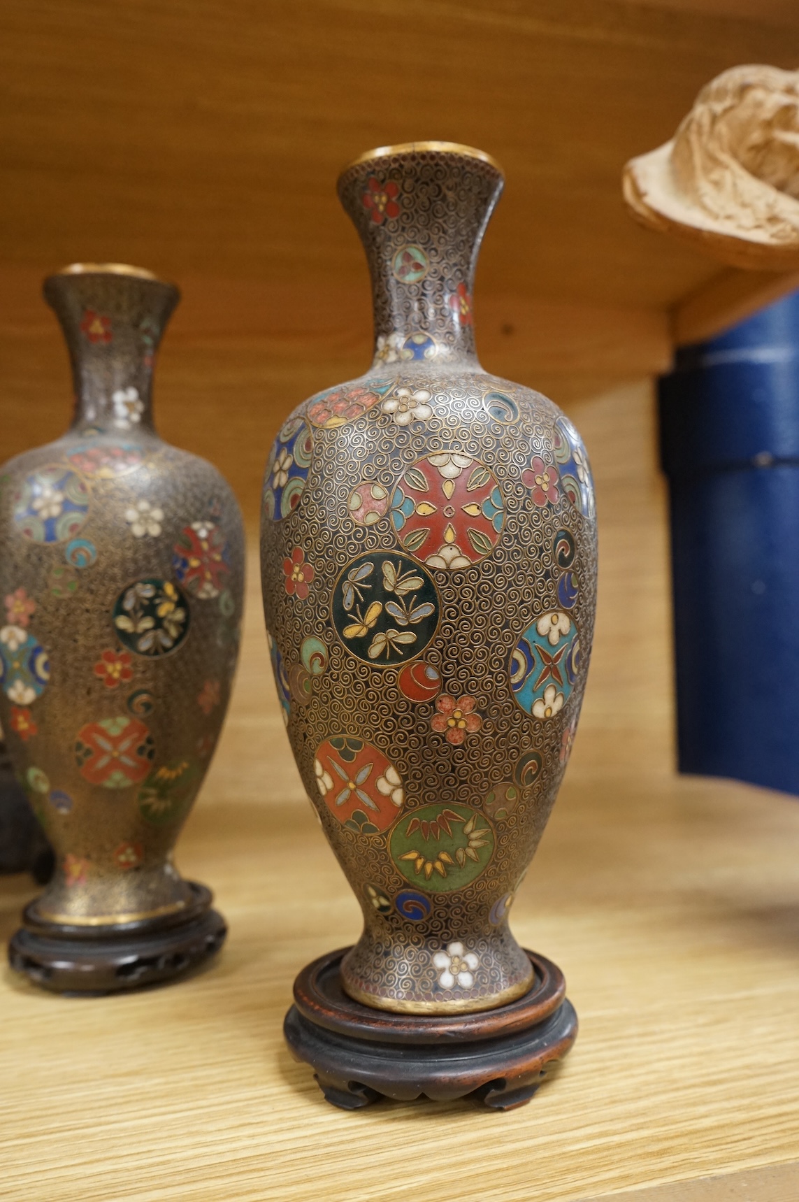 A Korean jar, a pair of Japanese cloisonné vases on stands and other items, largest 23cm high